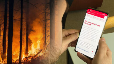 Man som känner klimatångest och kollar på mobil